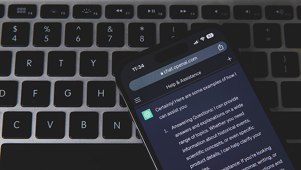Mobile phone with ChatGPT on keyboard
